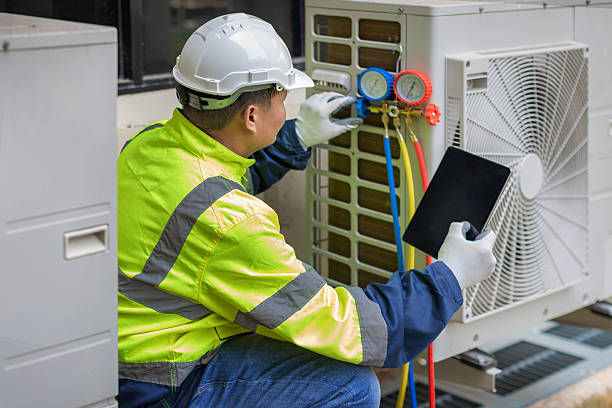 Professional Hvac technician working in Montevallo, AL